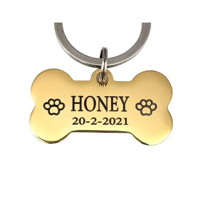 Honden penning graveren Bot Hondenpenning met naam en telefoonnummer goud